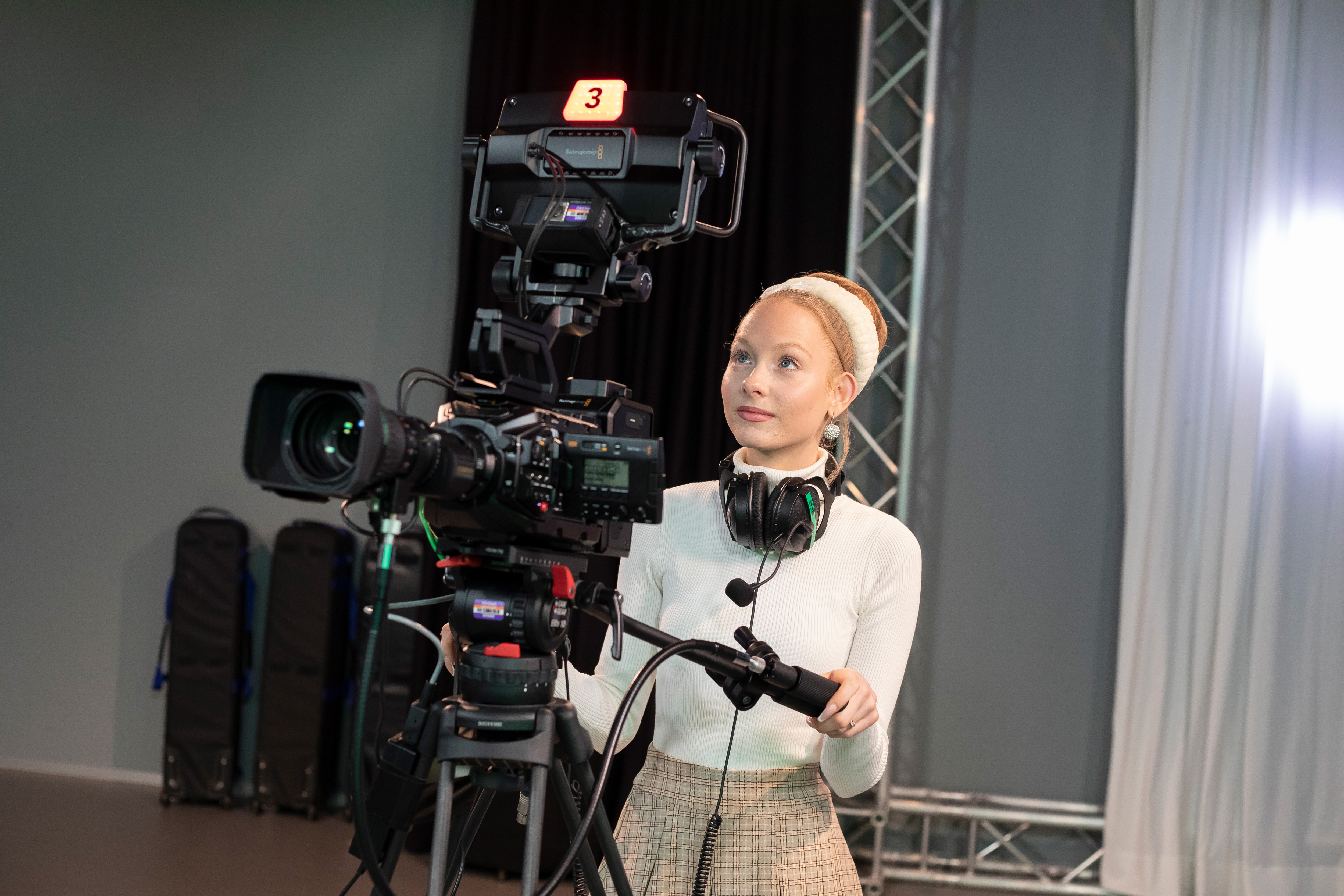 Een student met camera